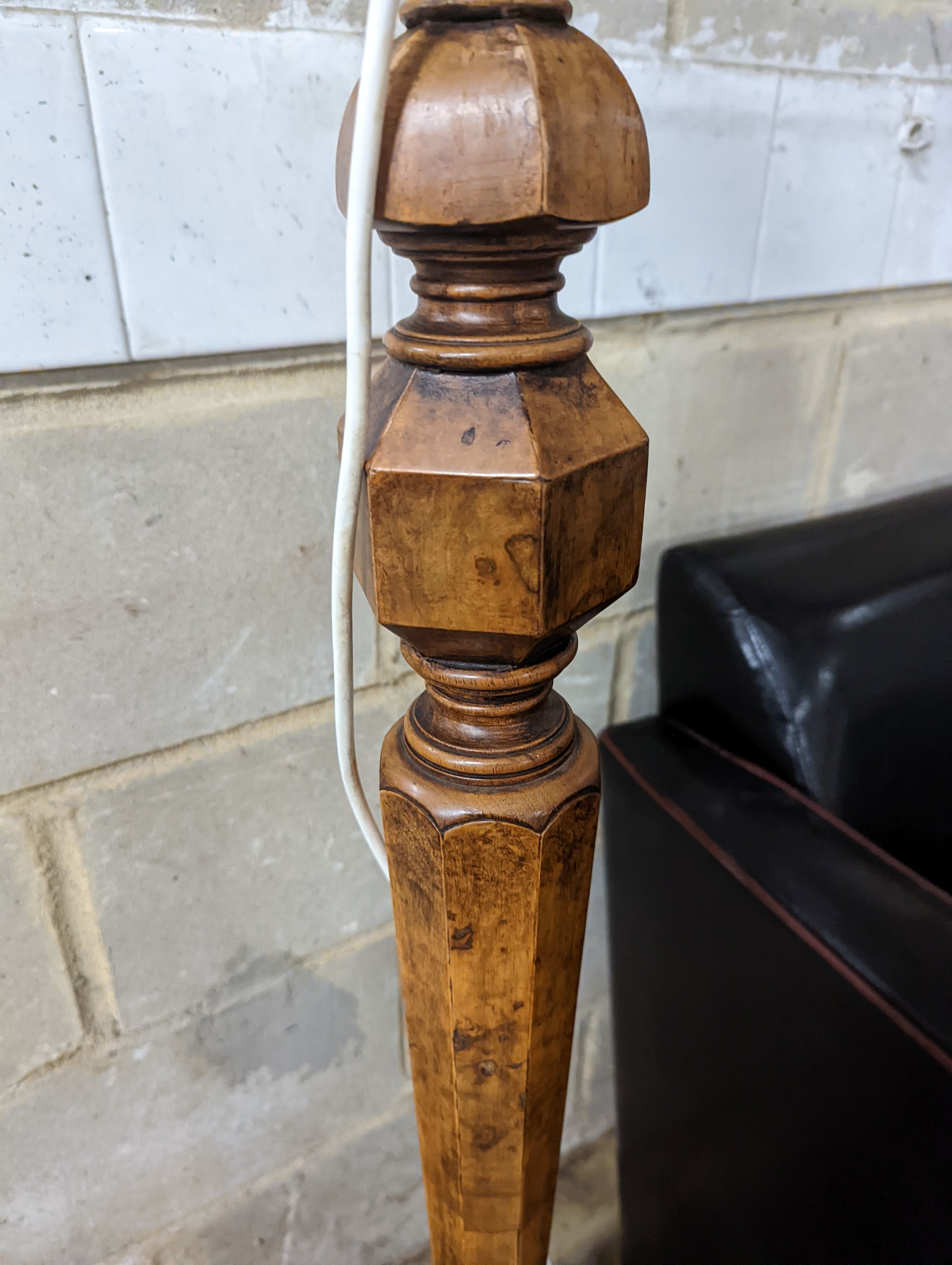 A 1920's Italian style burr walnut veneered tripod standard lamp, height 145cm